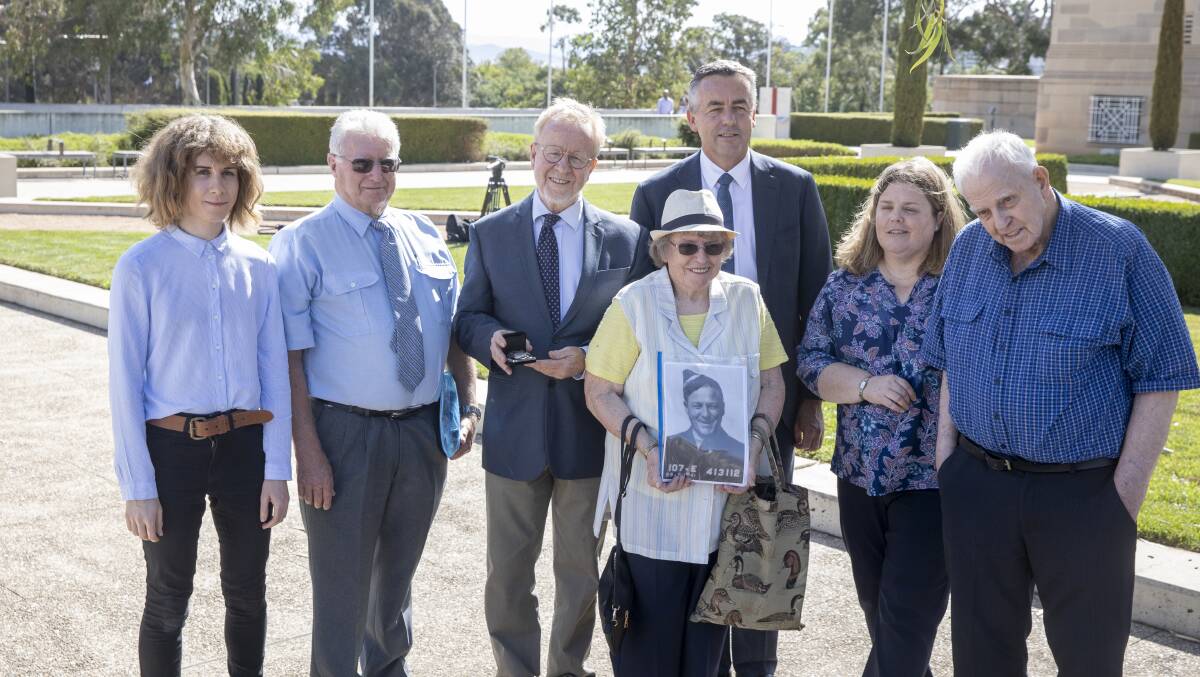 Veteran's Affairs Minister Darren Chester with Flight Lieutenant Kevin Fell's relatives Liska Fell, Kevin Fell (nephew), Kevin Fell (half-brother), Gai Winter, Cathy Winter, and Kevin Winter. Picture: Sitthixay Ditthavong