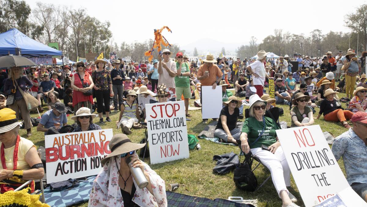 People rallying outside Parliament House on Tuesday listen to new Greens leader Adam Bandt speak. Picture: Sitthixay Ditthavong