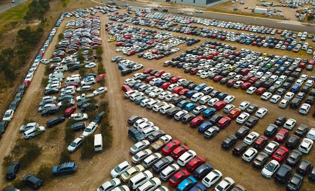 Hundreds of hail-damaged cars in a Hume holding yard. Picture: Supplied