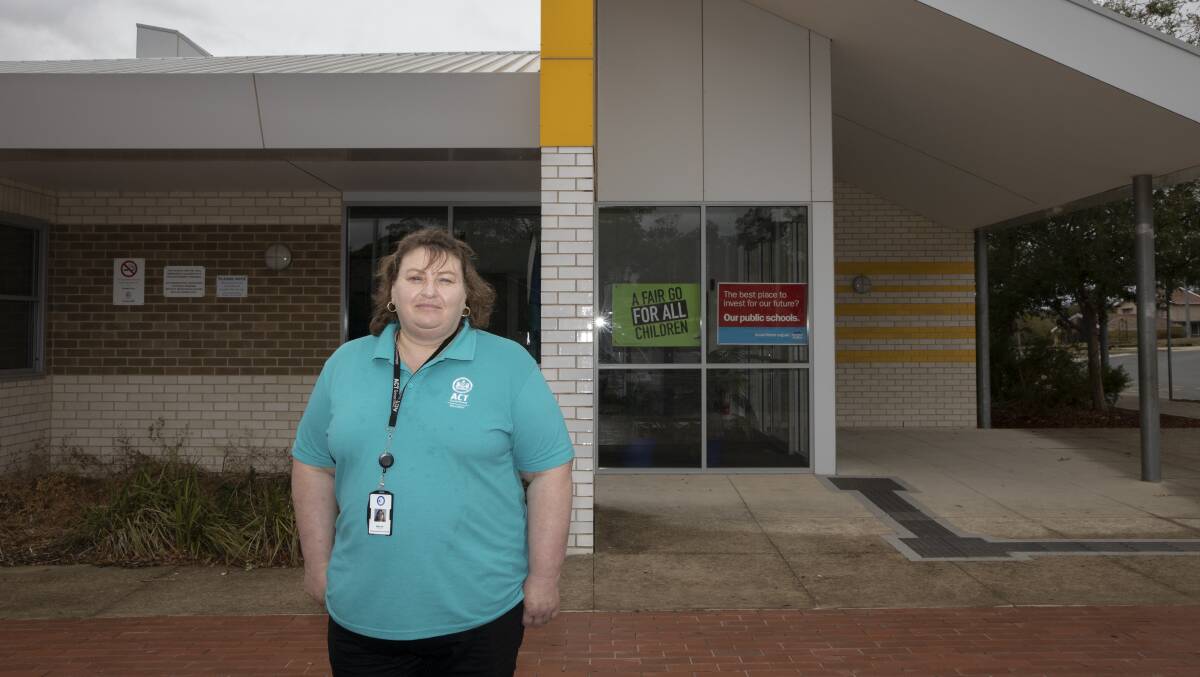 School cleaner supervisor Karen Love outside Kingsford Smith School in Holt. She's one of 270 public school cleaning staff newly employed by the ACT government. Picture: Sitthixay Ditthavong