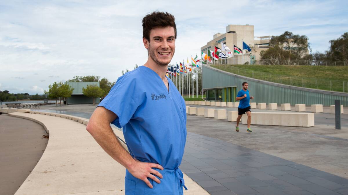 Ben Siddall is running The Canberra Times marathon in medical scrubs to raise awareness for doctor mental health. Picture: Elesa Kurtz