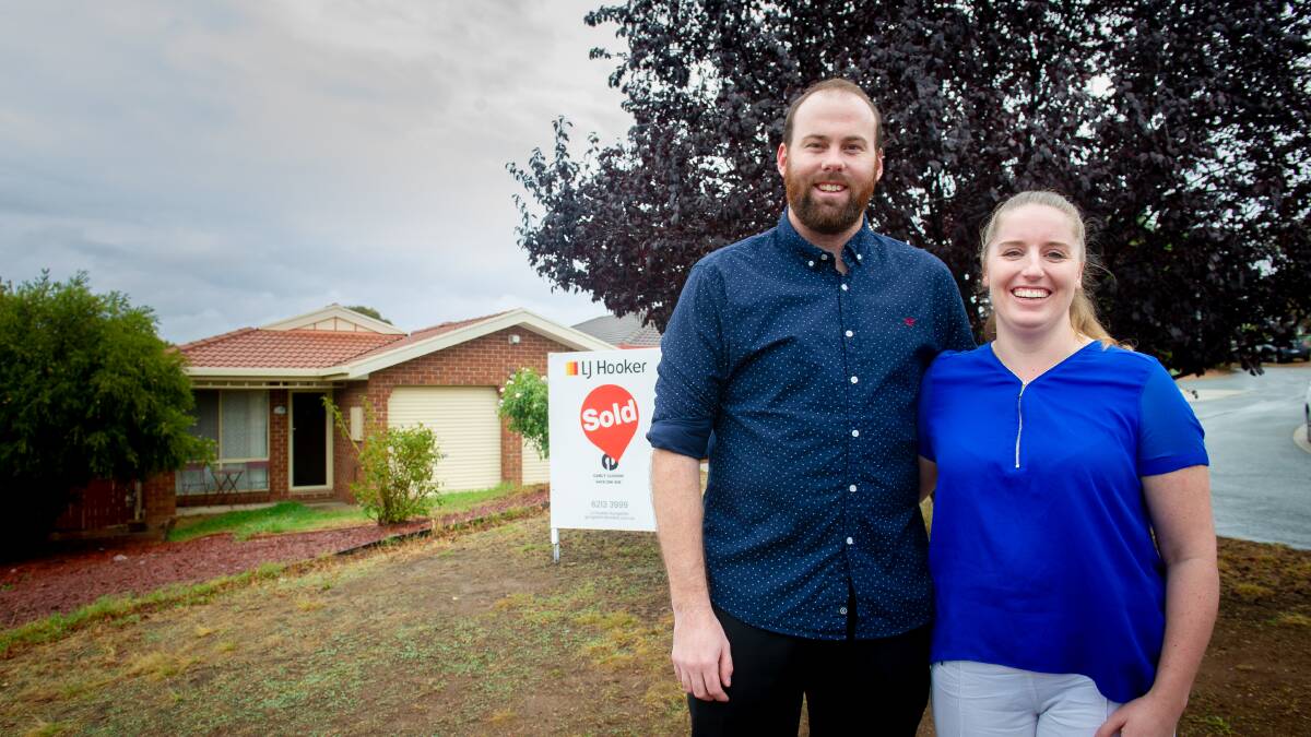 Layne Borrett and Grace Hancock have just purchased their first home in Ngunnawal. Picture: Elesa Kurtz