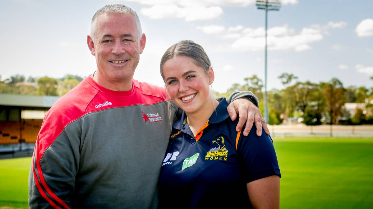 Former Brumby Nick Scrivener with daughter, Ainsley, who plays Super W. Picture: Elesa Kurtz.