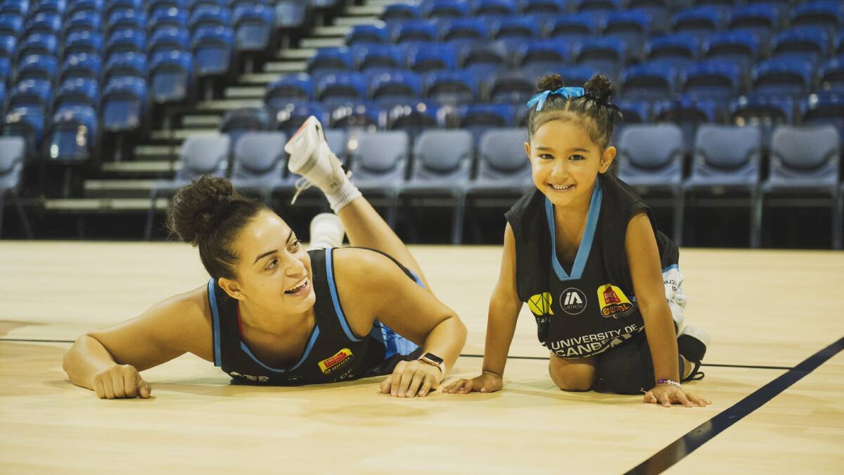 Maia Paku struggled to keep a smile off her face with Maddison Rocci at the AIS Arena. Picture: Dion Georgopoulos