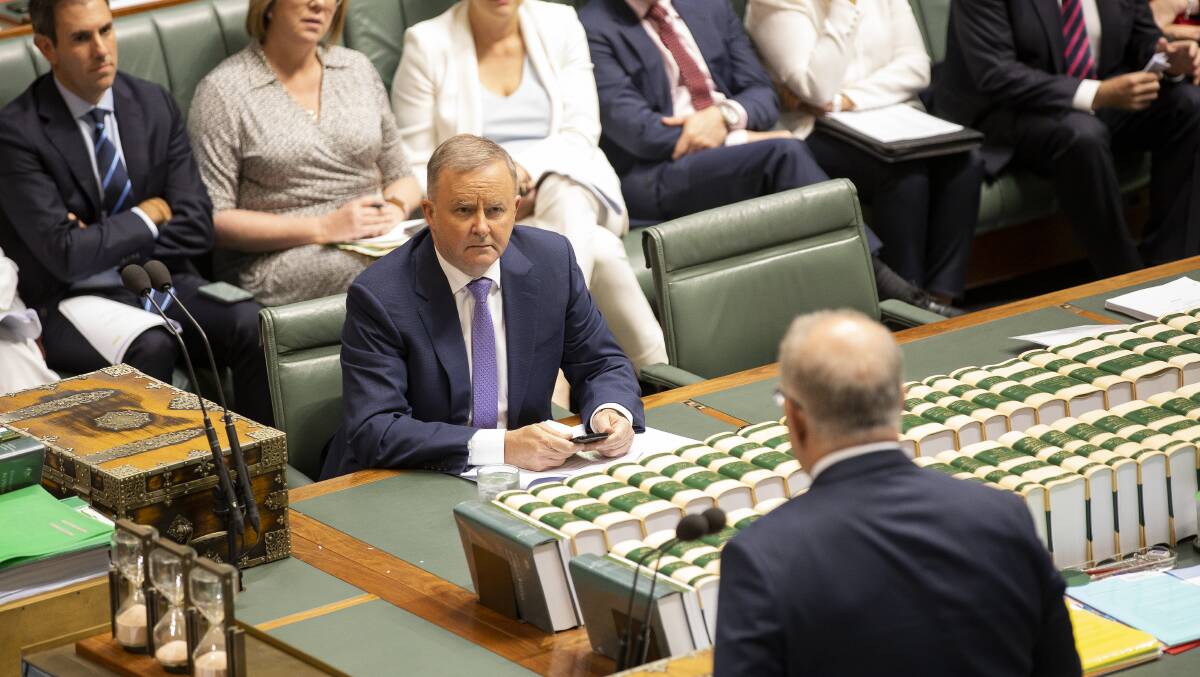 Opposition Leader Anthony Albanese listens to Prime Minister Scott Morrison during question time in February. Picture: Sitthixay Ditthavong