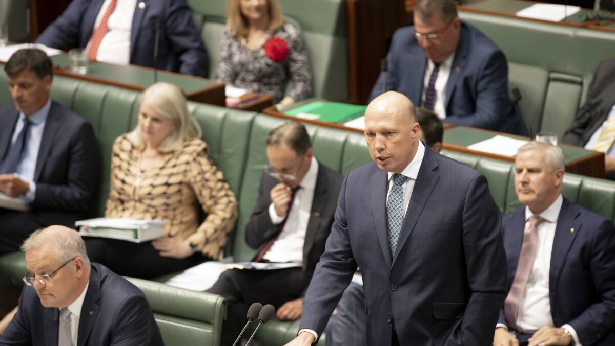 Home Affairs Minister Peter Dutton at the despatch box during question time in February. Picture: Sitthixay Ditthavong