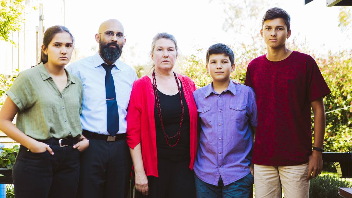 Aldrin and Jodie Jayatilaka with their children Rachael, 18, James, 14, and Timothy, 16. Aldrin and Jodie say their children have been unfairly targeted by Brindabella Christian College since they approached the school board last year with concerns. Picture: Jamila Toderas