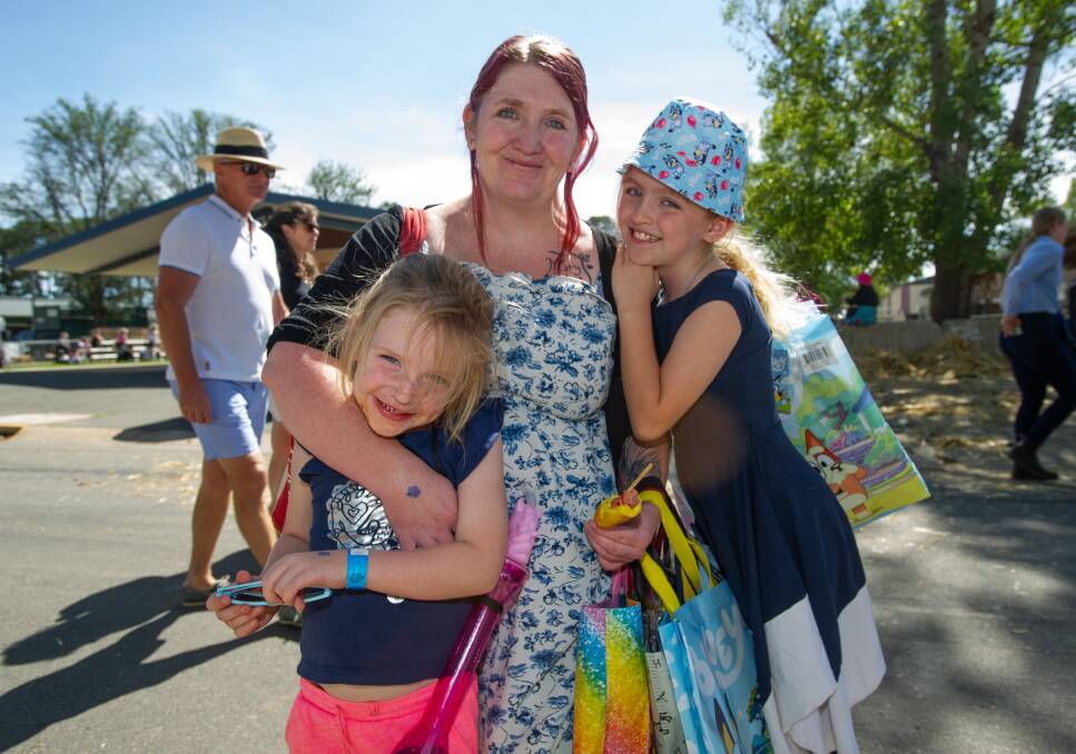 Samantha Davis with Willow and Layla Bishop, clutching their many showbags. Picture: Elesa Kurtz 