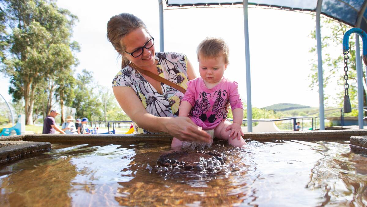 Sarah Gairey with daughter Juliette enjoy a splash at Weston Park as the end of summer loomed. Picture: Elesa Kurtz