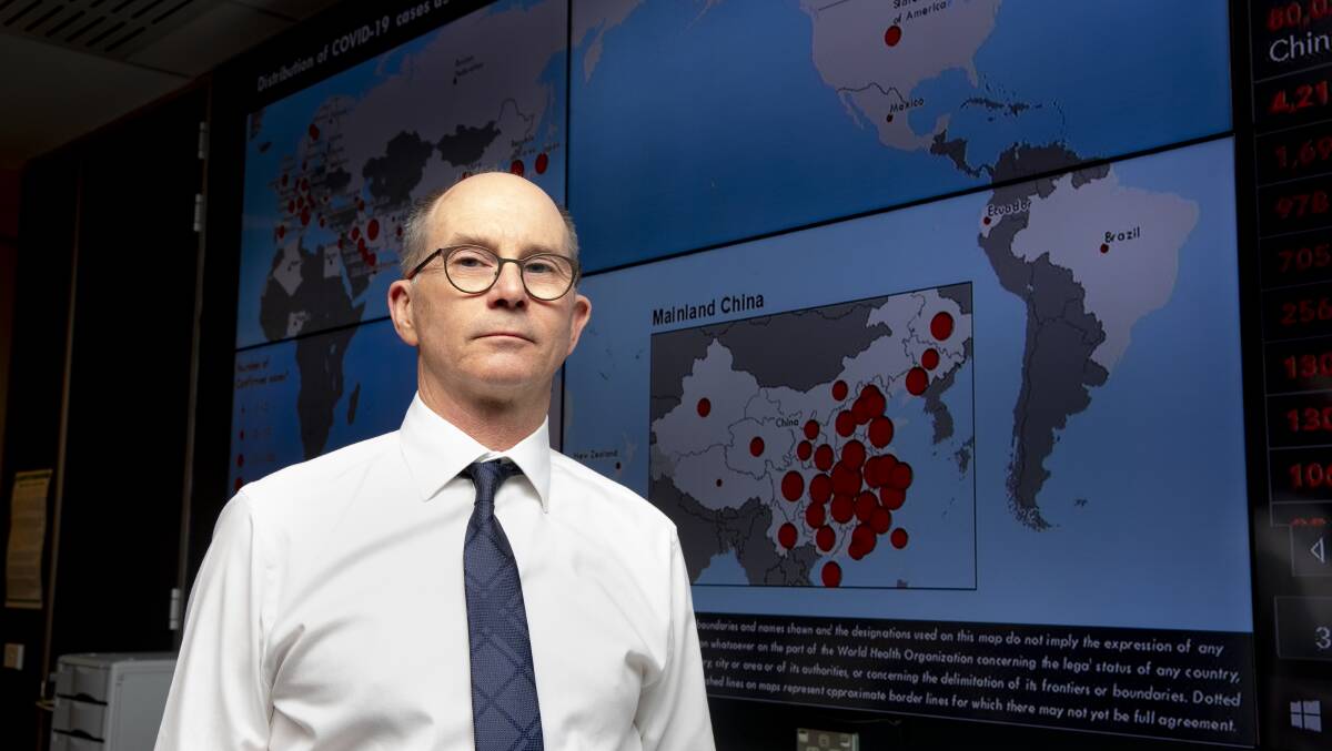 Deputy chief medical officer Professor Paul Kelly in the National Incident Room. Picture: Sitthixay Ditthavong
