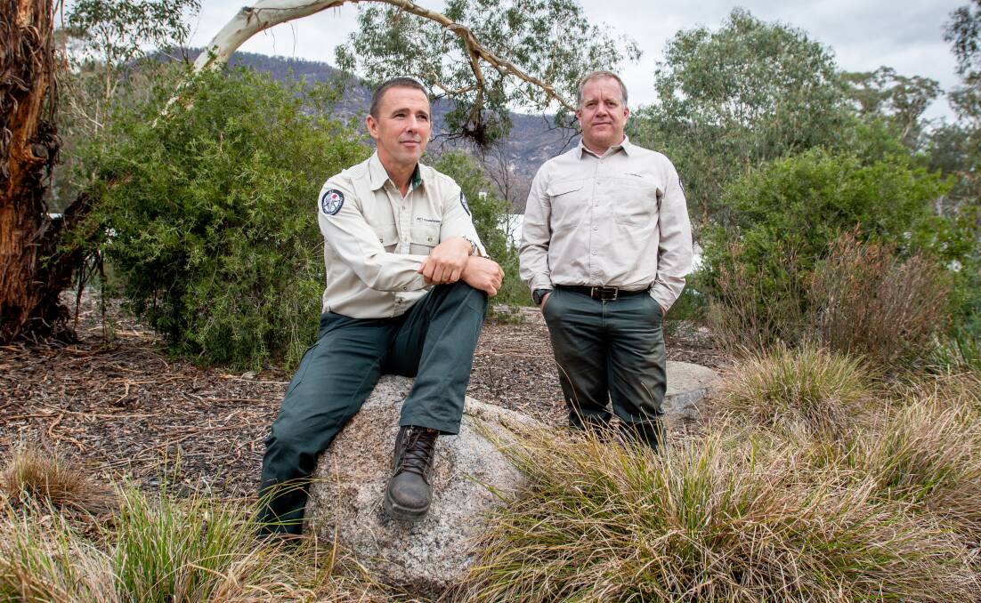 Leading the recovery effort in the Namadgi National Park is ACT senior ranger Peter Cotsell, left, with ACT Parks director Justin Foley. Picture: Elesa Kurtz.