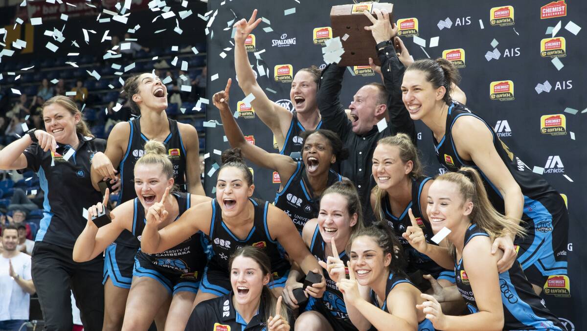 The Canberra Capitals claimed consecutive WNBL championships. Picture: Sitthixay Ditthavong
