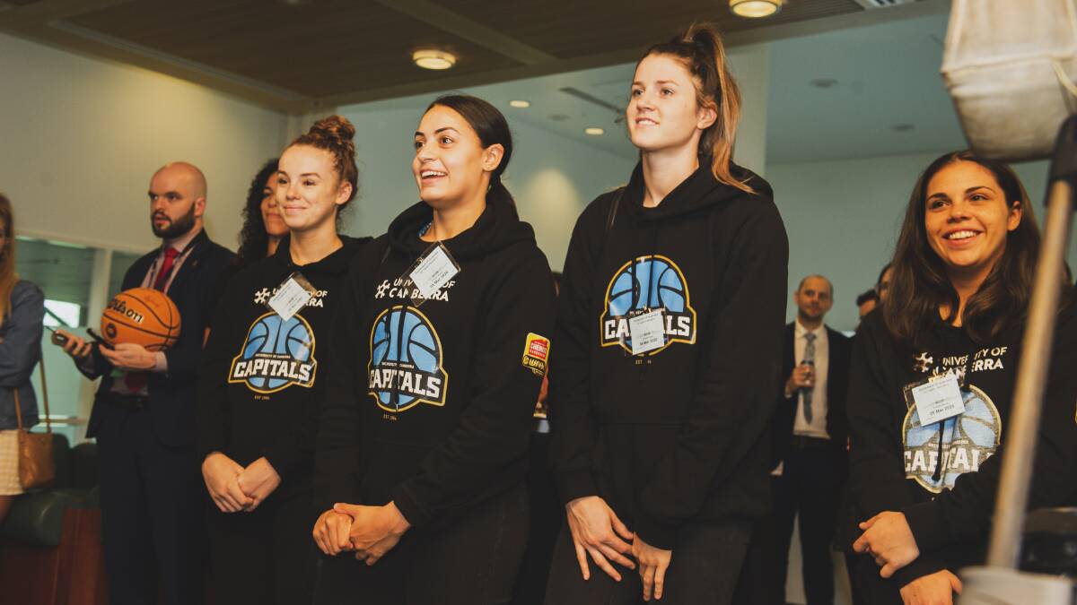 Canberra Capitals celebrate at a reception at Parliament House after winning the grand final. Picture: Dion Georgopoulos