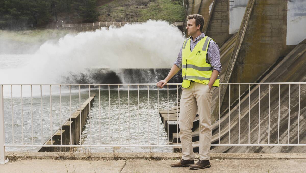 Scrivener Dam manager David Wright with the sluice gates open after recent rain. Picture: Dion Georgopoulos