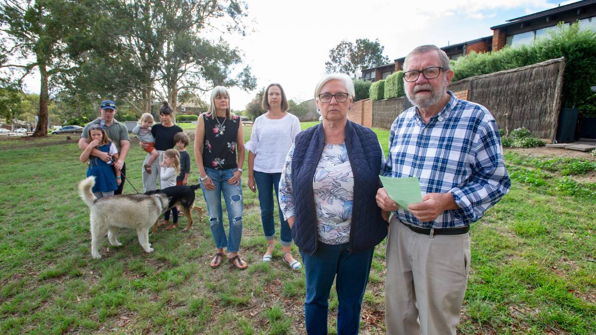 Robyn and John Davies with Watling Place neighbours in March 2020 who had opposes a temporary car park proposed for the open space behind their townhouses in Weston Creek. Picture: Elesa Kurtz