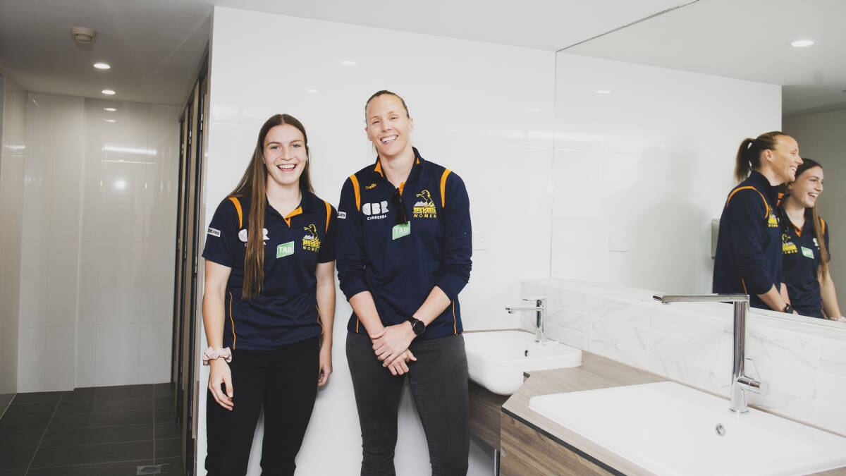 Brumbies players Ella Ryan and Shellie Milward at the new female-friendly change rooms. Picture: Dion Georgopoulos