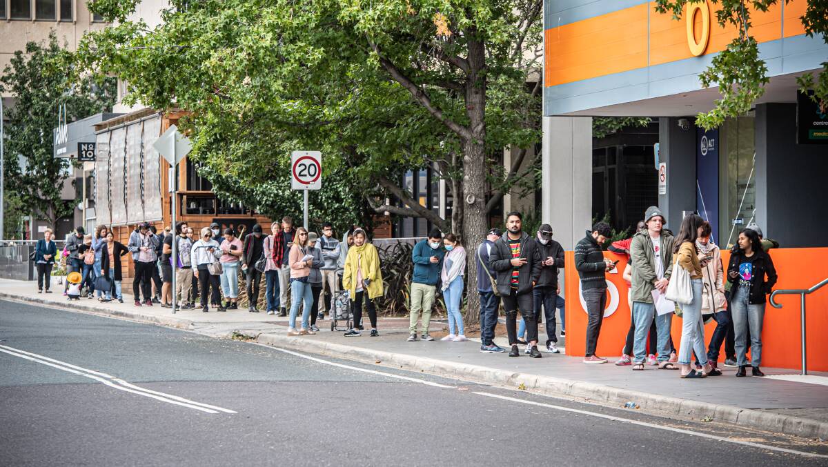 Queues outside the Woden Centrelink in March. Picture: Karleen Minney