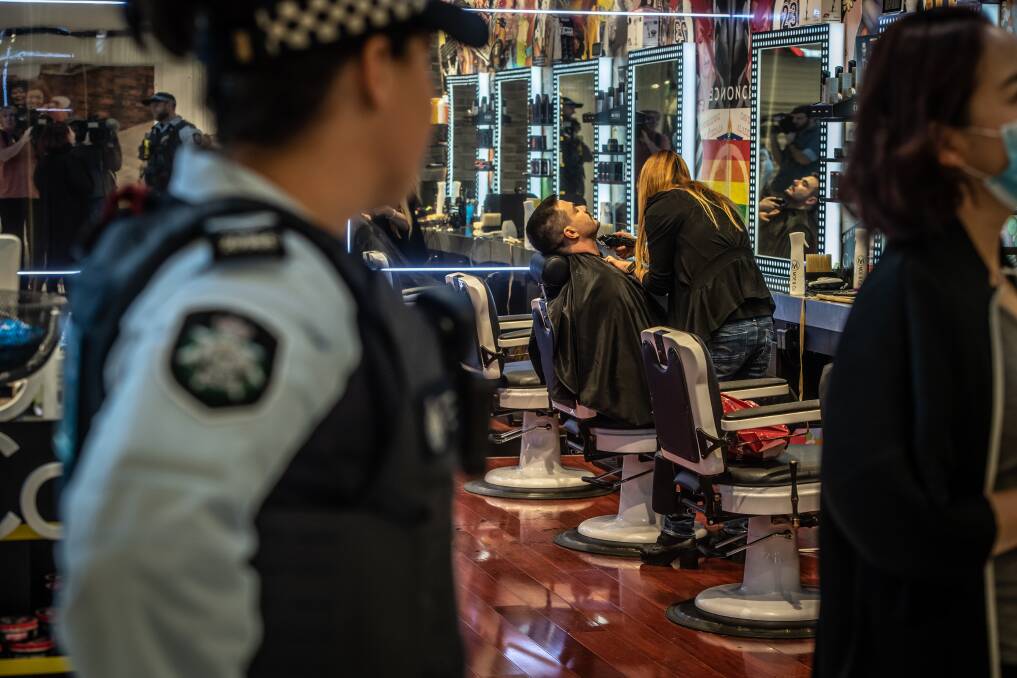 Police officers on patrol in Canberra city and the Canberra centre, encouraging people to follow social distancing directions. Picture: Karleen Minney