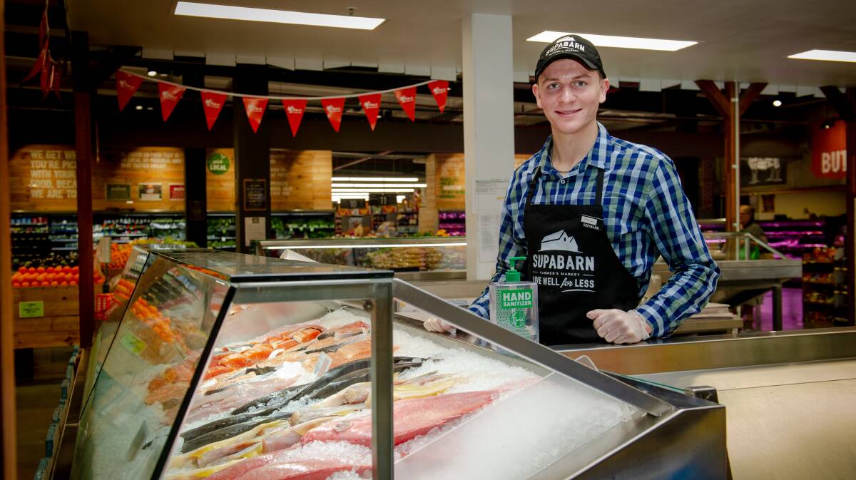 Casey Supabarn has seen an increase in demand. Seafood manager, Jakob Leishman, is just one of the many staff working around the clock at the supermarket. The store's operation manager says the number of customers has risen 50 per cent. Picture: Elesa Kurtz 