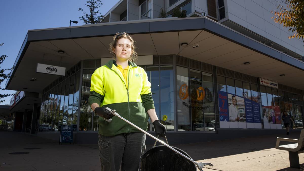 Essential worker Emma Featherstone works as a cleaner at Amaroo shopping centre. Picture: Sitthixay Ditthavong