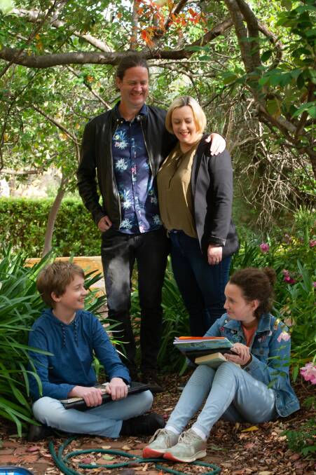 Home, work and school life has changed for the Lennane family of O'Connor. From left, Max, 13, dad James, mum Justine and Josie, 10. Picture: Karleen Minney