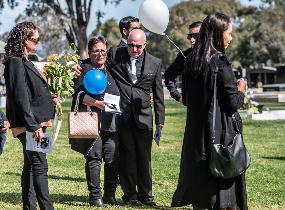 Parents, Maria and Peter Humphries (centre) and family and friends at the funeral of Jayson Humphries. PIcture: Karleen Minney
