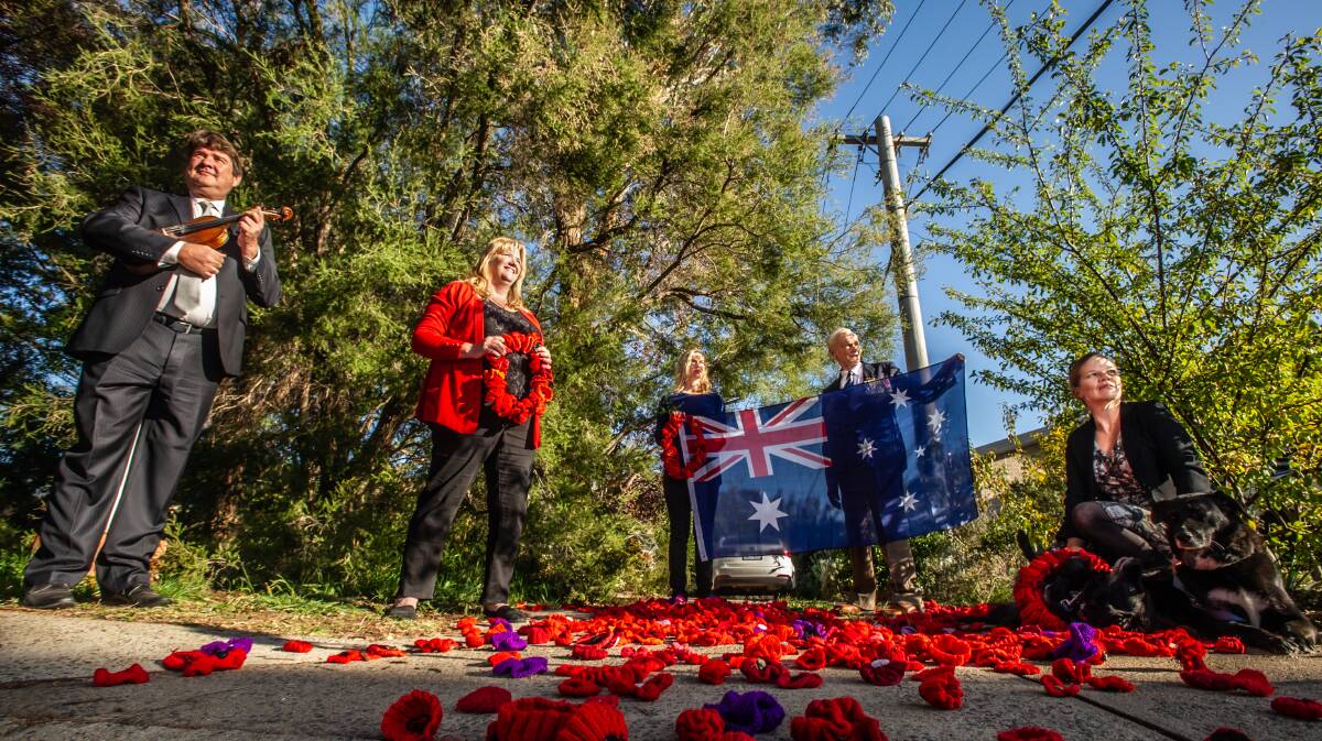 Chris Latham, Donna-Anne Quinn, Katie Chapman, Graeme Quinn and Camille McMahon will be just some of the residents of Atherton Street in Downer who will be doing their own dawn service in the street on Anzac Day this year. Picture: Karleen Minney.