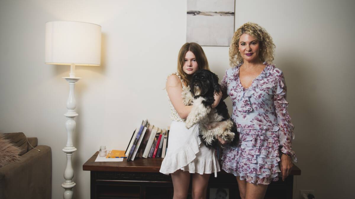 Carmen Garcia Gallo and daughter Victoria Cornock with dog Mogwai inside their Kingston foreshore apartment. Picture: Dion Georgopoulos 