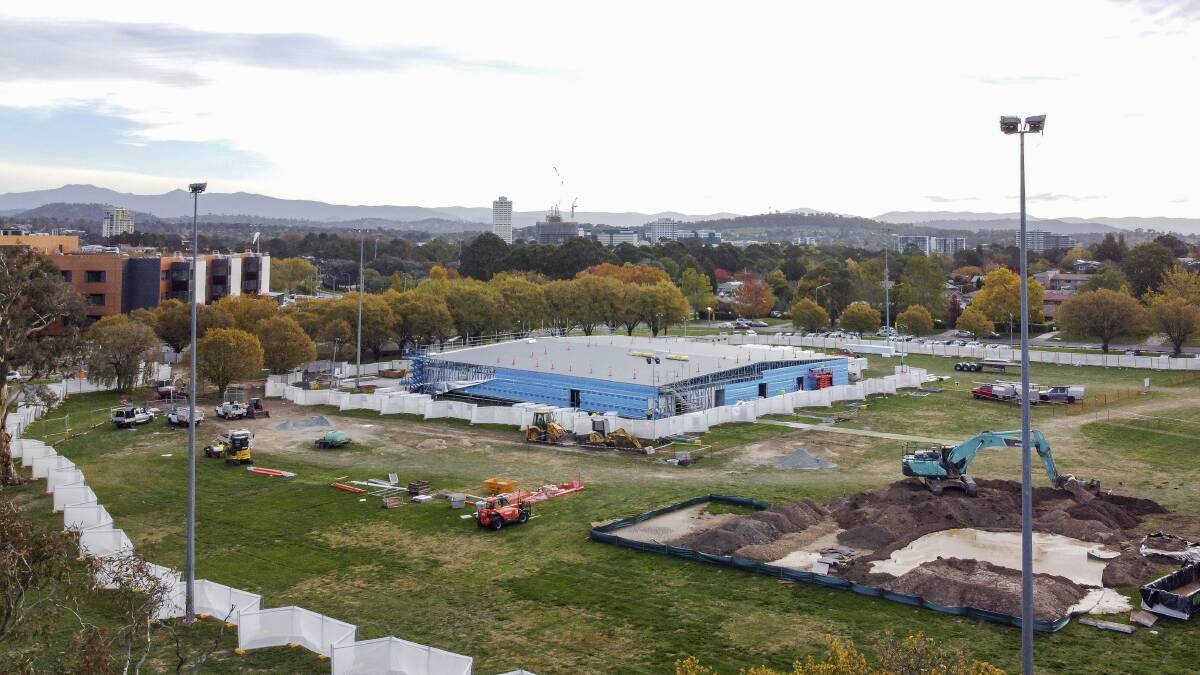 Temporary COVID-19 emergency department under construction at Garran Oval.