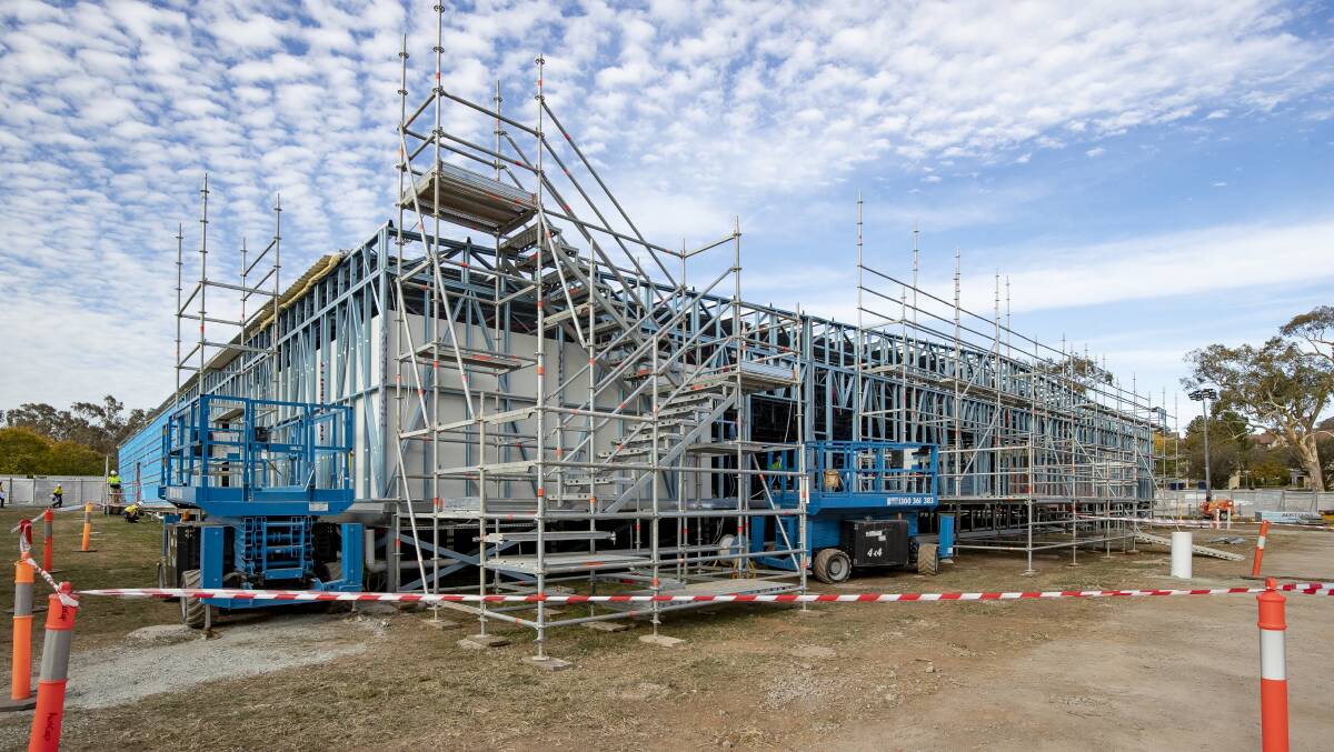 The temporary COVID-19 emergency department under construction at Garran Oval. Picture: Sitthixay Ditthavong