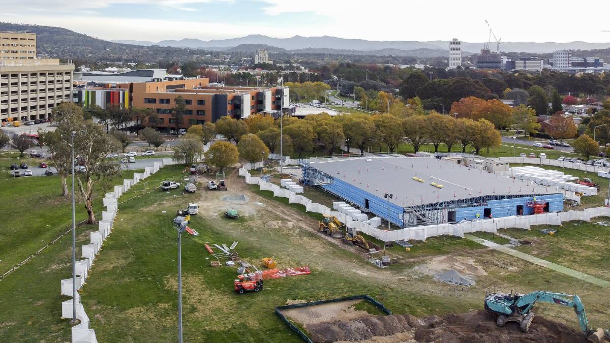 Temporary COVID-19 emergency department under construction at Garran Oval. Picture: Sitthixay Ditthavong. 