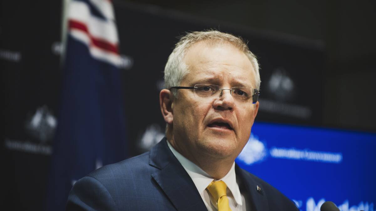 Prime Minister Scott Morrison at Friday's press conference. Picture: Dion Georgopoulos