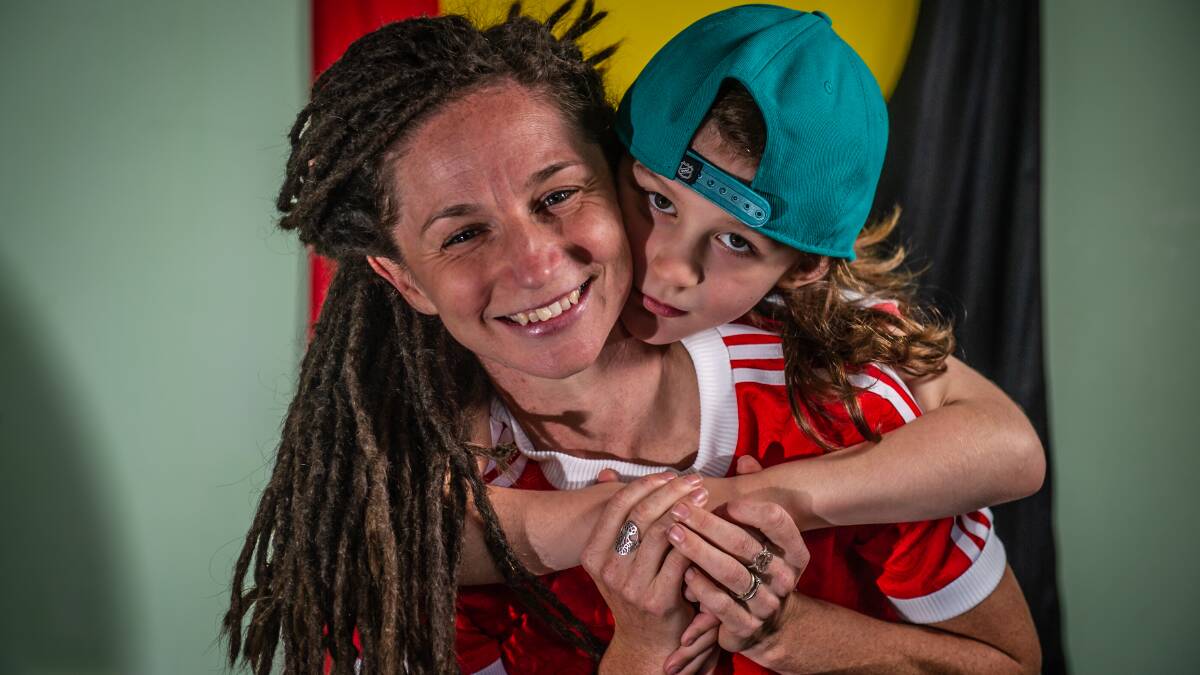 Olympic race walker Beki Smith, a 'Share A Yarn' ambassador, with six year old son Lennon. Picture: Karleen Minney