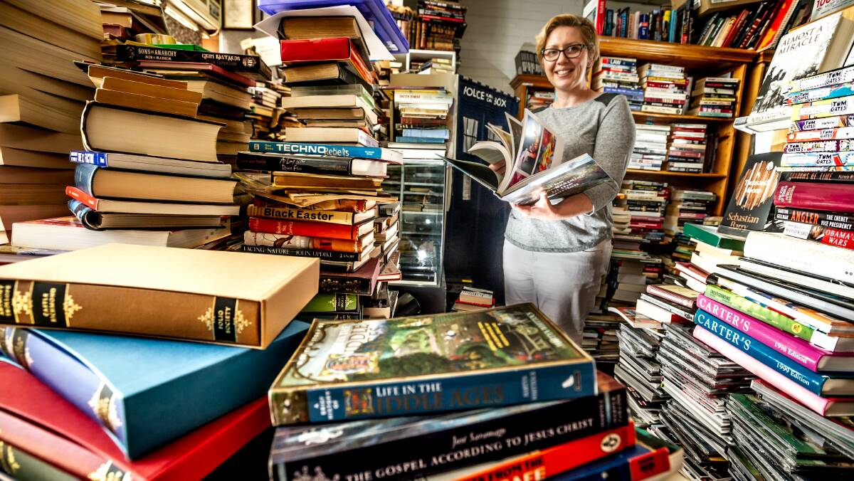 Laura Canty of Canty's bookshop in Fyshwick, busy keeping the business going. Picture: Karleen Minney