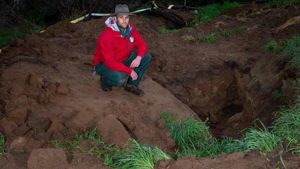 Ranger Richert Ahlers, at Molonglo Reserve at Coppins Crossing where a wombat hole was excavated because a dog got trapped while off lead. Picture: Elesa Kurtz