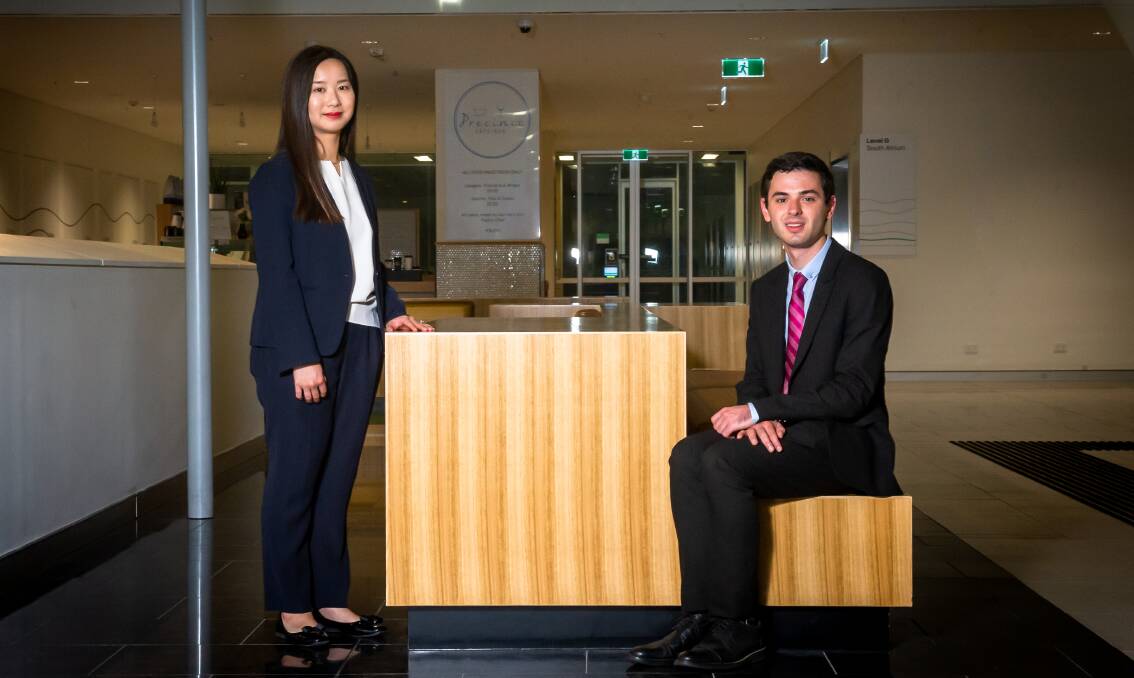 Department of Foreign Affairs and Trade graduates Yan Kok and Will Paparo have started their public service careers during COVID-19. Picture: Elesa Kurtz