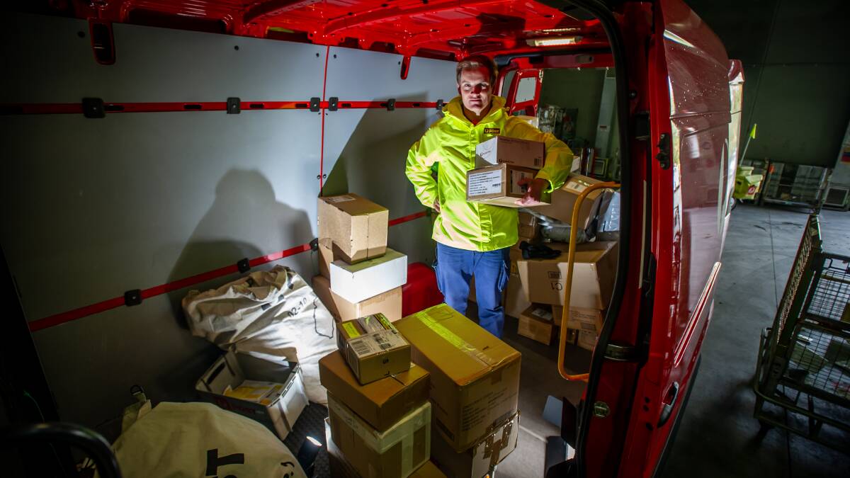 Australia Post team leader Alan O'Callaghan said the number of parcels increased to Christmas levels from late March as customers shop online. Picture: Karleen Minney