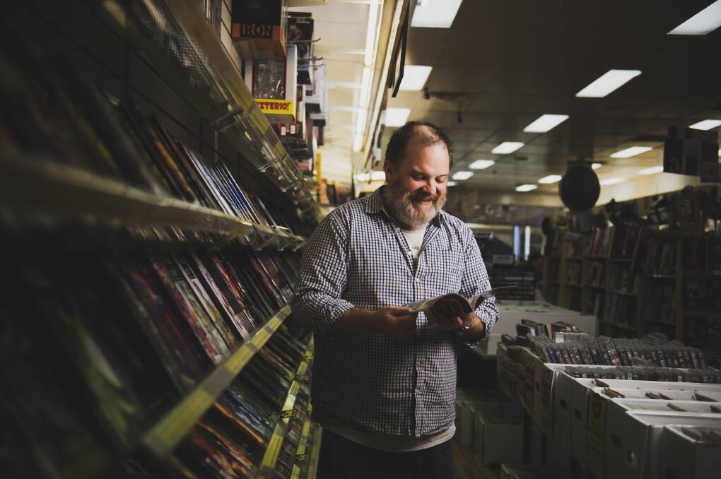 Impact Comics co-owner Mal Briggs says store has missed incidental shoppers, such as people out in the evening waiting to go to a restaurant and office workers on their lunch break. Picture: Dion Georgopoulos 