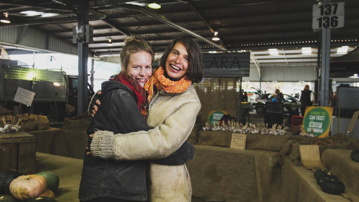 Marie and Beatrice Koening at their farmers' market stall for Ingelara produce. Picture: Dion Georgopoulos