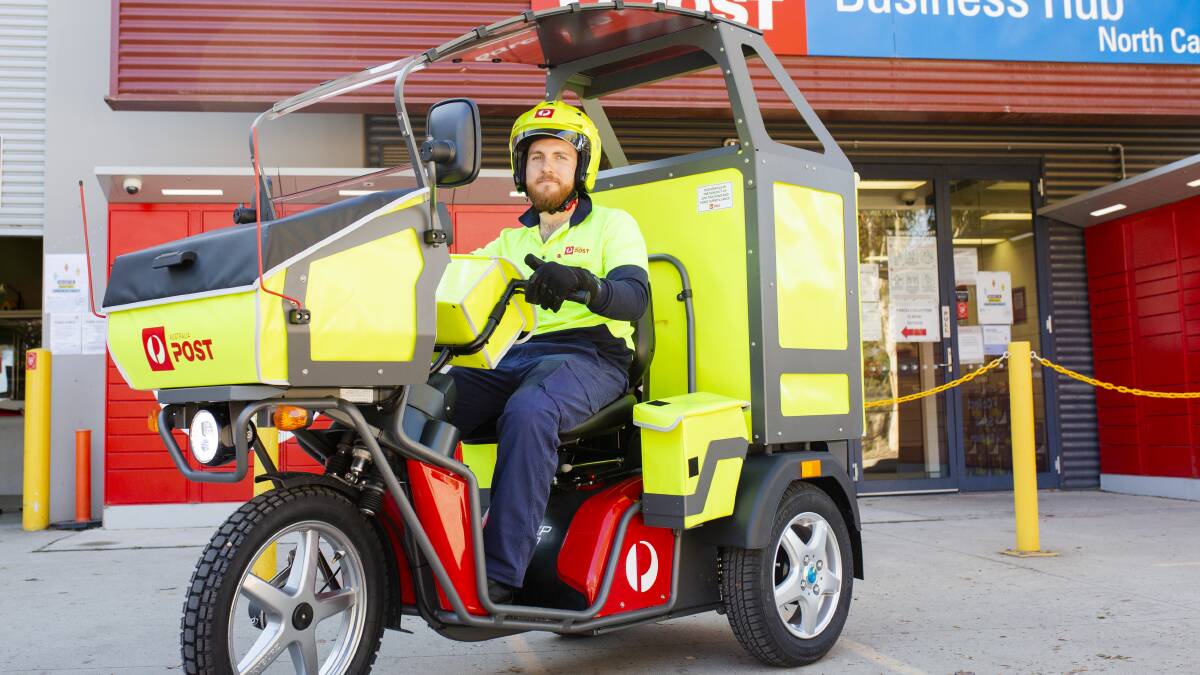 Australia Post are introducing electric delivery vehicles within Canberra. Postal delivery officer Brad Loiterton. Picture: Jamila Toderas