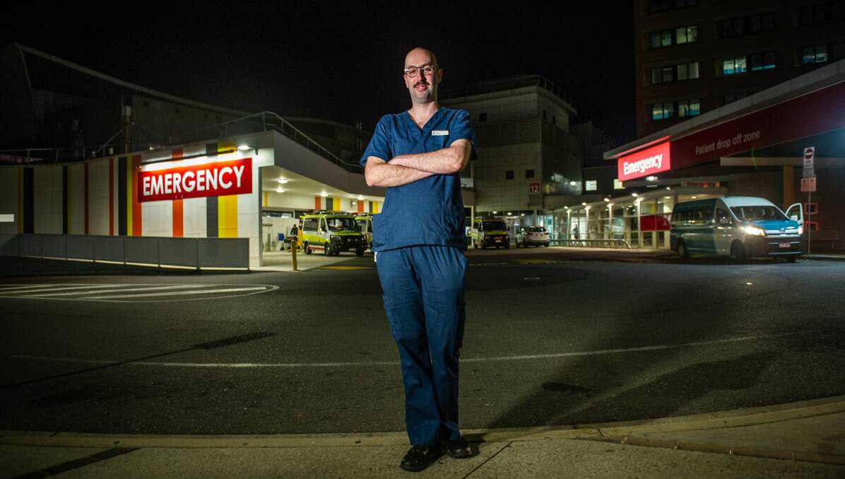 ICU nurse Tom Jeffrey on night shift at the Canberra Hospital. Picture: Karleen Minney