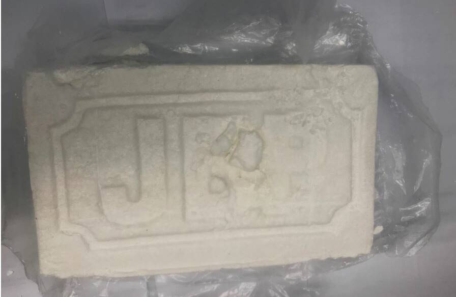 One kilogram brick of cocaine seizure in Dunlop in May last year. Picture: AFP 