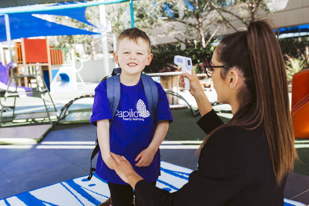 Papilio Early Learning Barton centre manager Katelyn Pollard, with two-year old Zac Carter. Picture: Jamila Toderas 