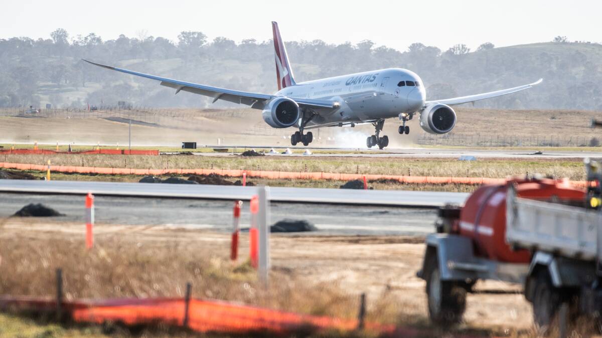 A chartered flight from India bringing back stranded Australian citizens arrives at Canberra International Airport. Picture: Karleen Minney