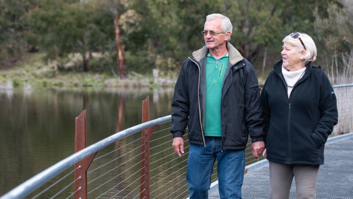 Terry and Sue Burgess on the boardwalk at Tidbinbilla Nature Reserve, which reopened to the public. Picture: Elesa Kurtz