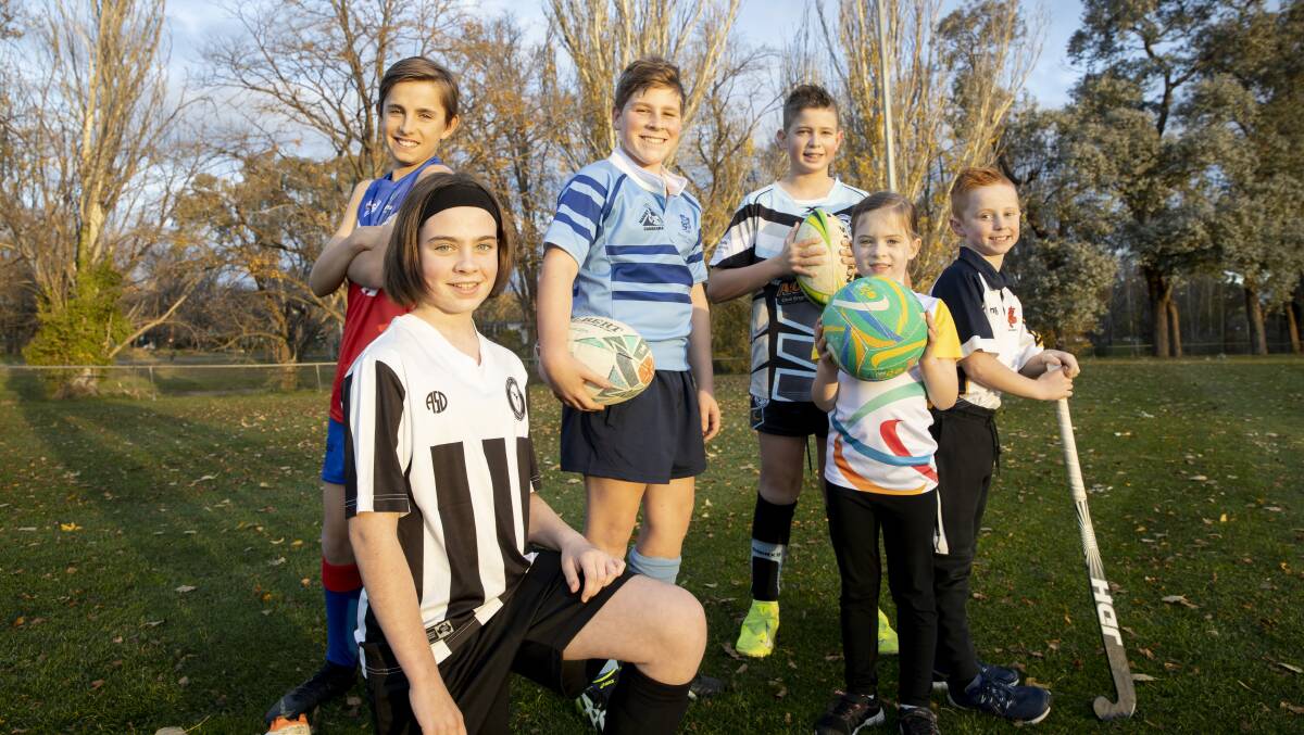 Aiden Henderson, AFL (11), Georgie Burrows, soccer (10), Fletch Burrows, rugby union (12), BJ Pumpa, rugby league (12), Annabelle Brown, netball (6), and Charlie Jenkins, hockey (9) are all excited about the return to sport. Picture: Sitthixay Ditthavong