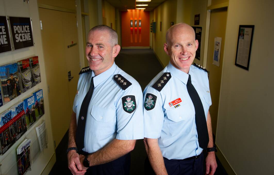 Brothers and sergeants Adrian and Matt Craft are two of the 14 newly-declared inspectors in ACT police. Their father was also an inspector many years ago. Picture: Elesa Kurtz