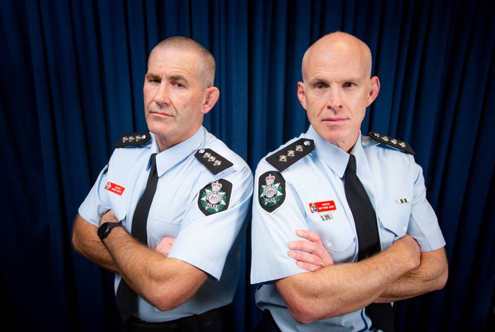 Brothers Adrian and Matt Craft have been declared inspectors in ACT police. Their father was also an inspector many years ago. Picture: Elesa Kurtz 