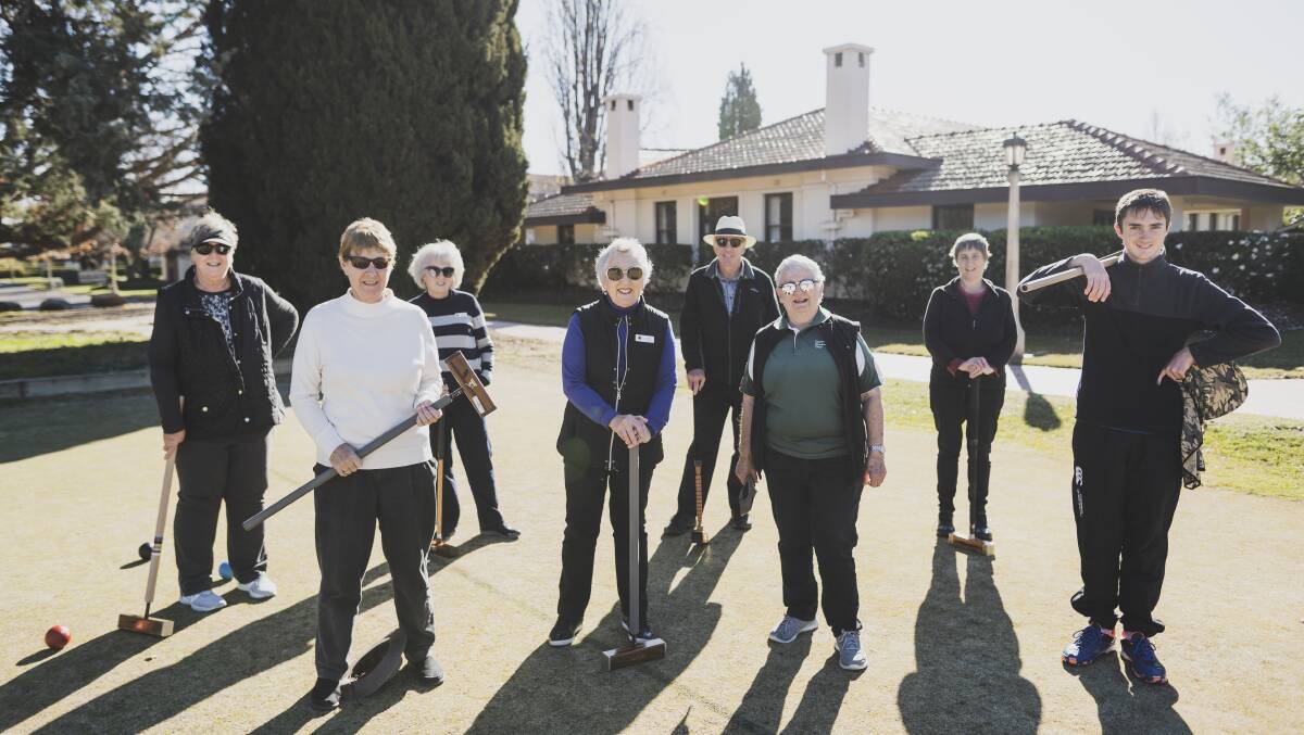 Members at the Canberra Croquet Club in Yarralumla on Saturday. Picture: Dion Georgopoulos