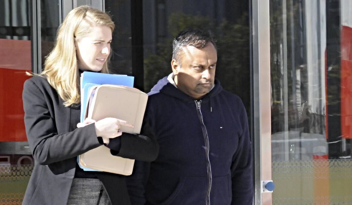 Gopalakrishnan Suryanarayanan Vilayur, right, who is charged with conspiring to defraud the Commonwealth and abuse of public office. Picture: Blake Foden